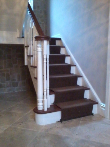 Stairs 18-Cut Sting with Monkeys Tail Mainly in Softwood with stained oak steps & Handrail