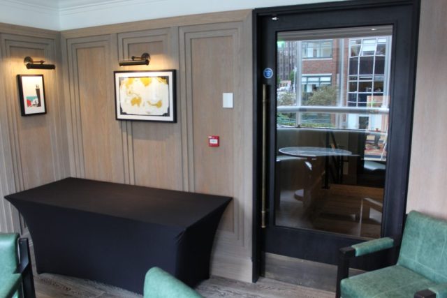 50-Stained Oak Wall Panelling & glazed fire door